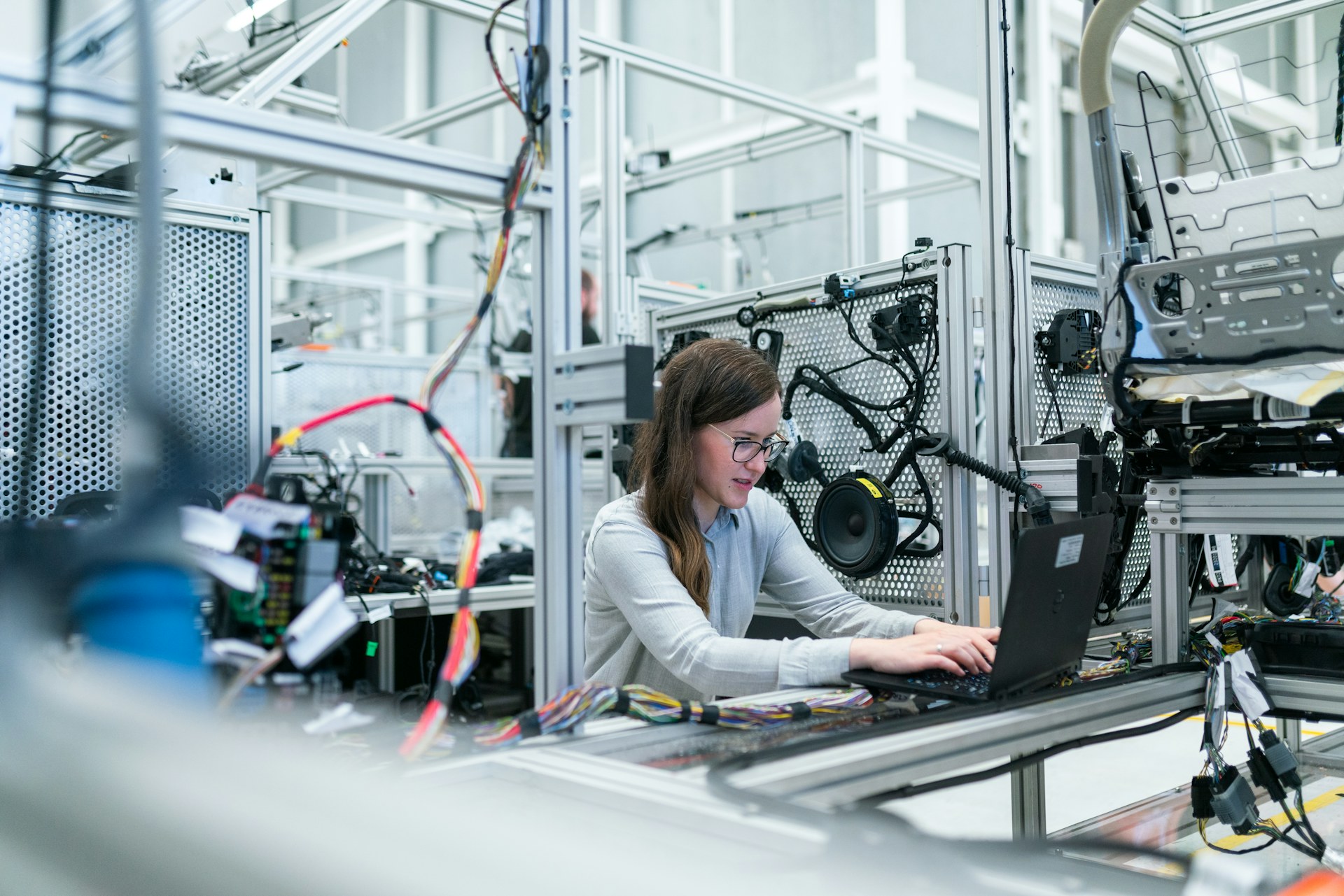 Engineer reviewing technical drawings in a plant